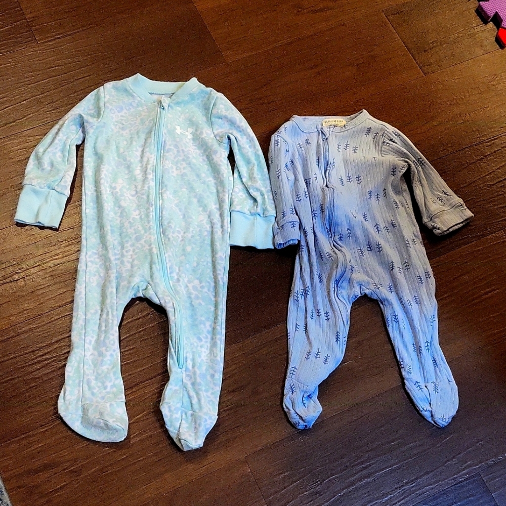 Set of two Footsie Pajamas. Blue. 6-9 months. Under Armour. Rabbit + Bear